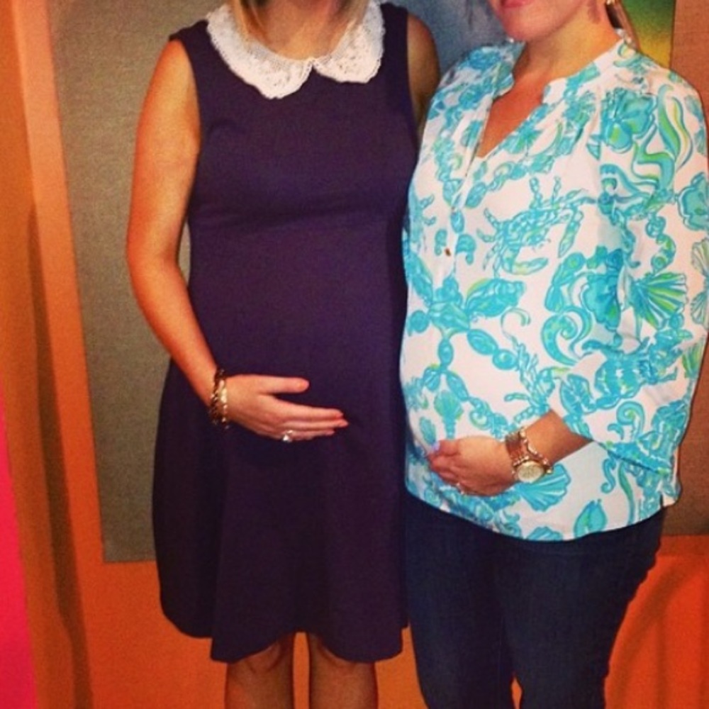 Maternity sleeveless navy dress with lace detail